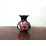 A William Moorcroft miniature 'Hibiscus design vase,