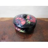 A Walter Moorcroft 'Anemone' design lidded trinket pot,