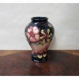 A Walter Moorcroft 'Oberon' pattern vase, marks to base,