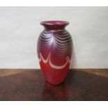 An Okra iridescent glass vase,