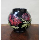 A Walter Moorcroft 'Anemone' design vase of spherical form,