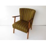 A 1940's Danish oak framed cocktail chair with original upholstery.