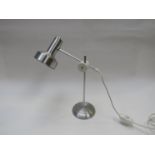 An aluminium adjustable desk lamp