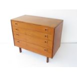 A 1960's teak chest of four drawers by Alfred Cox .