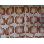 A pair of 1970's curtains with orange geometric design.