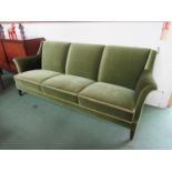 A 1940's Danish three seater sofa in original green velvet upholstery.