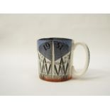 A Wedgwood Festival of Britain mug designed by Norman Makinson. 7.