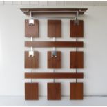 A wood and metal wall hanging coat rack. 112cm x 74cm x 23.