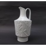 A Edelstein white porcelain ewer vase, Paradise relief, designed by Kurt Wendler, 1960's Germany,