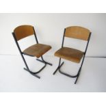 Two childrens tubular metal framed chairs with bent plywood seats