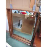 A large 1960's Danish teak framed wall mirror.