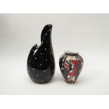 An abstract small hand painted decorative vase and black and white piazza ware stylised 1950's