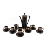 A Portmeirion Greek key pattern coffee set by Susan Willaims Ellis in brown and gold