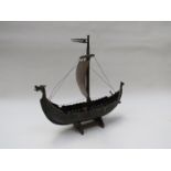 A brass viking long boat by E.