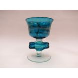 A Mdina glass large goblet in blue and ochre on clear base, etched "Mdina Glass 1976", 19.