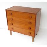 A Danish teak chest of four drawers. 76cm x 43cm x 76.