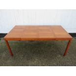 A Vejle Stole-Mobelfabrik Danish teak extending dining table.