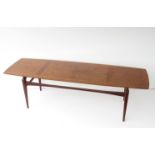 A 1960's Danish teak coffee table. 170cm x 54cm x 48.