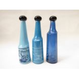 Salvador Dali- 1970/71 set of three Rosso Antico glass bottles with the Spanish surrealists screen