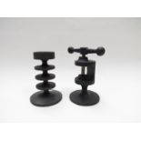 A Robert Welch Hobart cast candlestick and cast nutcrackers