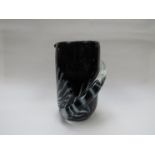 A signed Art Glass vase in black with applied spiral, indistinct signature.