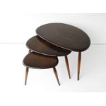 A nest of three Ercol Windsor pebble tables