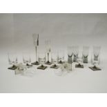 Nine Rosenthal "Linear Smoke" drinking glasses by Georg Jensen, clear on square smoked glass base,