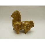 An Italian Pottery mid Century horse money box, mustard and red glazes,