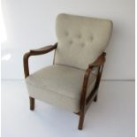 A 1940's Danish beech framed lounge chair with original upholstery.