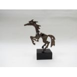 An abstract stylised Italian metal horse sculpture, on base,