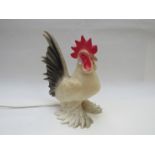 A plastic Heico lamp in the form of a rooster