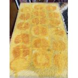 A Danish Rya rug with yellow abstract design.