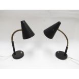 A near pair of 1960's desk lights in black with cone shades