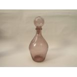 A large pink soda glass bottle with glass stopper.