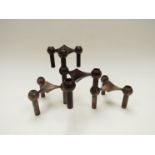 Four bronze modular Nagel candle holders,