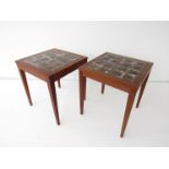 A pair of Danish teak occasional tables with tiled inset tops.
