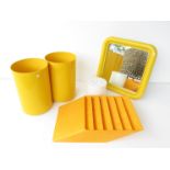 Two yellow plastic vintage Crayonne designer bins and a mirror,