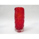 A Whitefriars ruby red 'bark' glass vase, designed by Geoffrey Baxter, model #9731. 19.