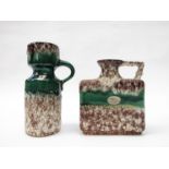 Two Jopeko green glazed single handled jug with treacle lava over glaze, labelled,