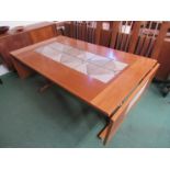 Danish Mobler teak and geometric tiles extending dining table.