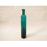 A Riihimaen Lasi Oy green bottle vase by Nanny Still.