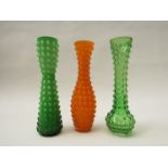 Three continental glass bud vases with moulded 'bobbles' in green and orange,