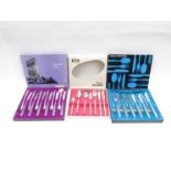 A Viners boxed 'Exective Suite' set of six fish knives and forks,