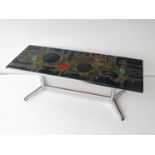 An abstract tiled top coffee table. 122.5cm x 46.