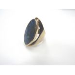 A 9ct gold ring set with oval stone,