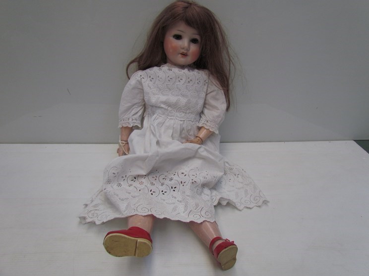 A bisque head, composition body Simon & Halbig girl doll, 70cms tall,