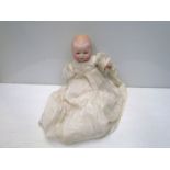 A bisque head, composition hand Armand Marseille baby doll,