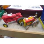 A 1950's plastic Massey Harris tractor and Mettoy tractor with driver