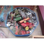 A tin of mixed lead and diecast models including tractors,