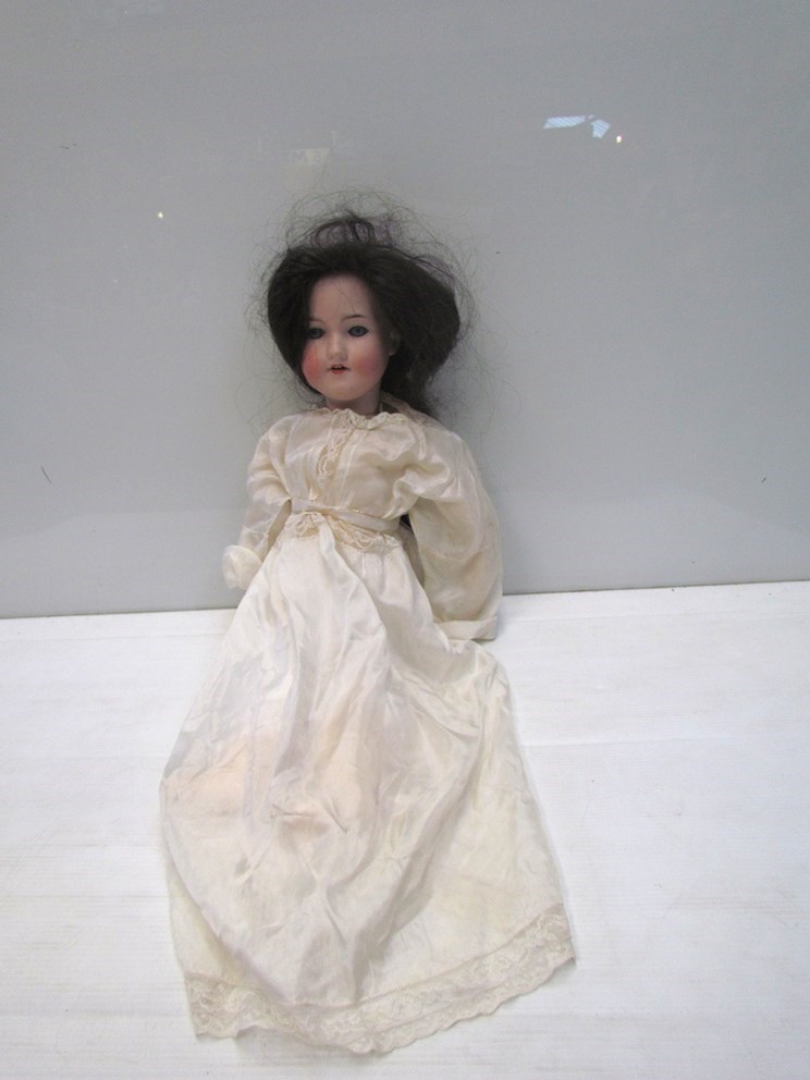 A bisque head, composition body Armand Marseille doll, 59cms,